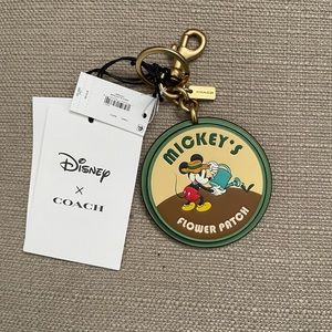Disney X Coach Bag Charm in colour soft green new